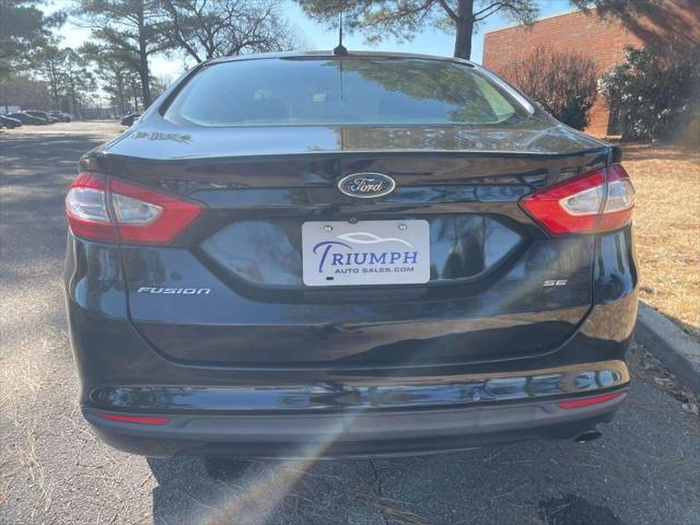 used 2016 Ford Fusion car, priced at $8,900