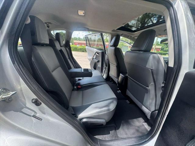 used 2013 Toyota RAV4 car, priced at $14,999
