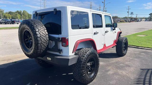 used 2015 Jeep Wrangler Unlimited car, priced at $21,688