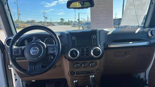 used 2015 Jeep Wrangler Unlimited car, priced at $20,688