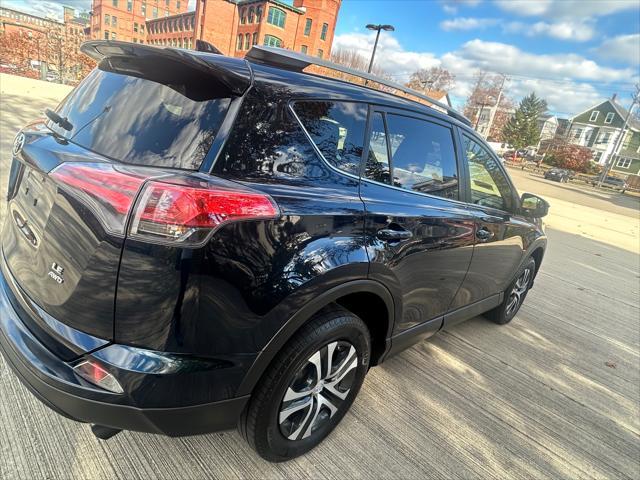 used 2018 Toyota RAV4 car, priced at $17,990