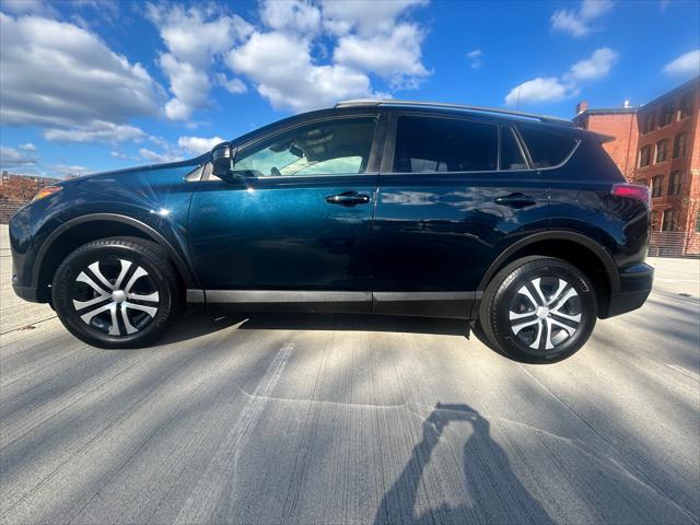 used 2018 Toyota RAV4 car, priced at $17,990