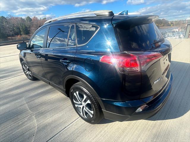 used 2018 Toyota RAV4 car, priced at $17,990