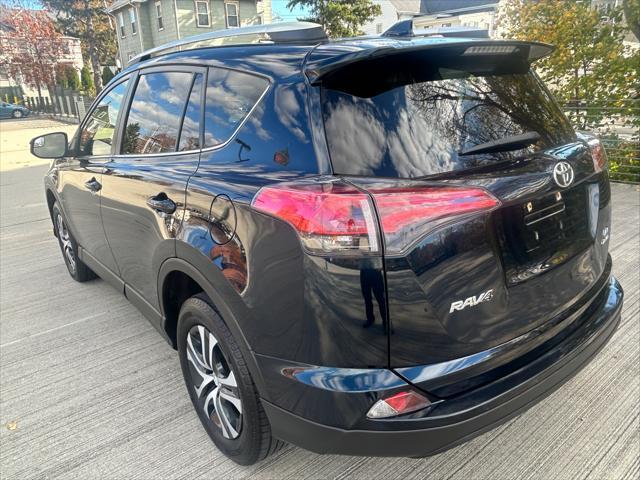 used 2018 Toyota RAV4 car, priced at $17,990