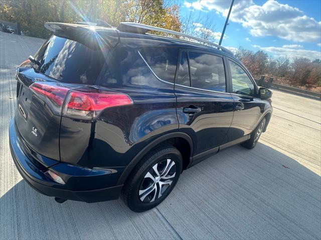 used 2018 Toyota RAV4 car, priced at $17,990