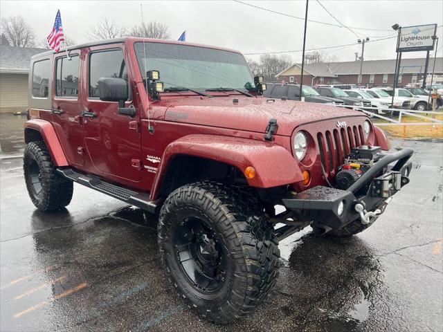 used 2009 Jeep Wrangler Unlimited car, priced at $12,990