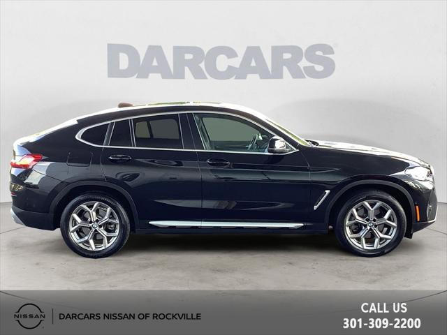 used 2023 BMW X4 car, priced at $41,304