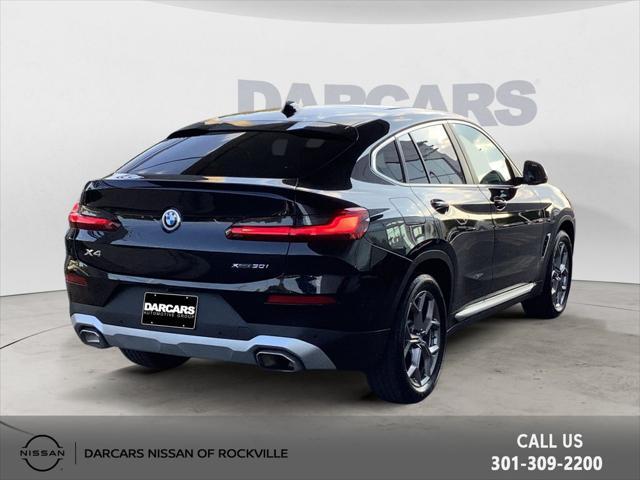 used 2023 BMW X4 car, priced at $41,304