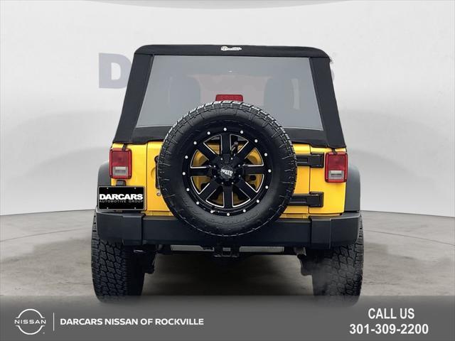 used 2015 Jeep Wrangler Unlimited car, priced at $18,490