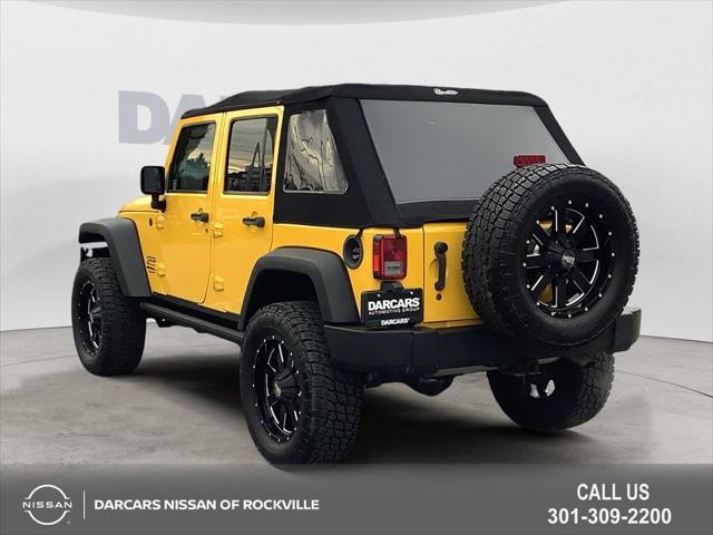 used 2015 Jeep Wrangler Unlimited car, priced at $18,490