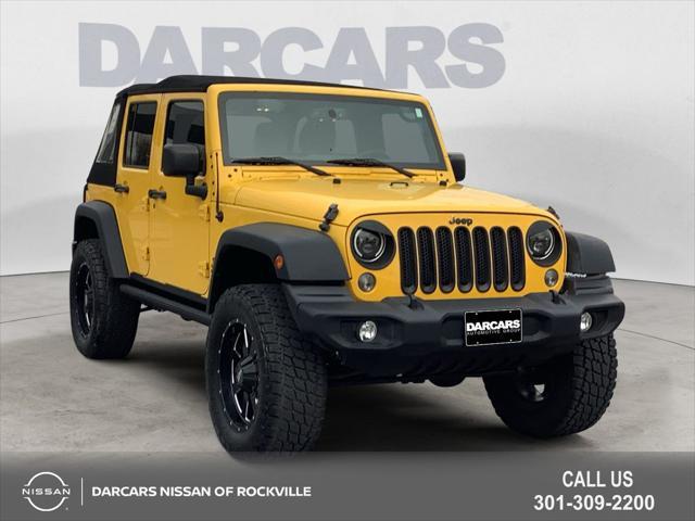 used 2015 Jeep Wrangler Unlimited car, priced at $18,490