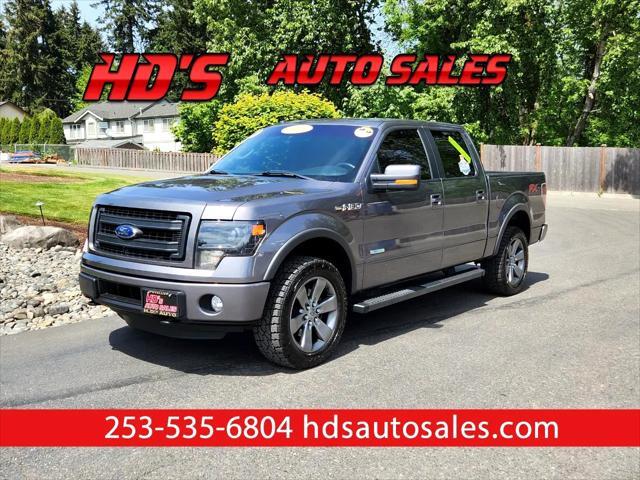 used 2014 Ford F-150 car, priced at $19,999