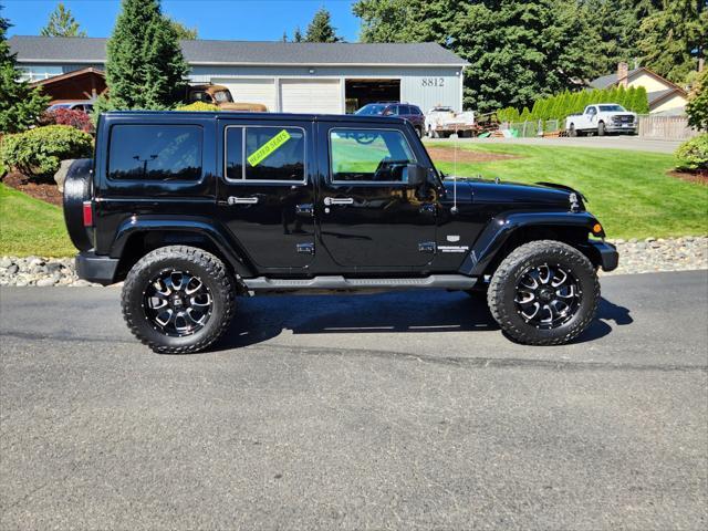 used 2011 Jeep Wrangler Unlimited car, priced at $18,988