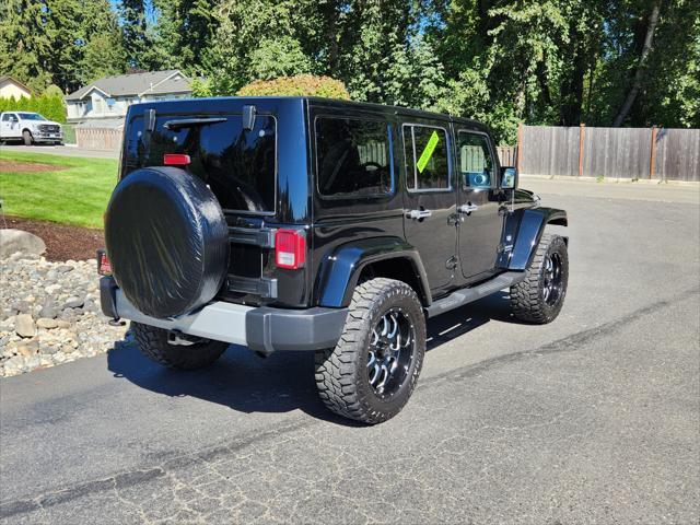 used 2011 Jeep Wrangler Unlimited car, priced at $18,988