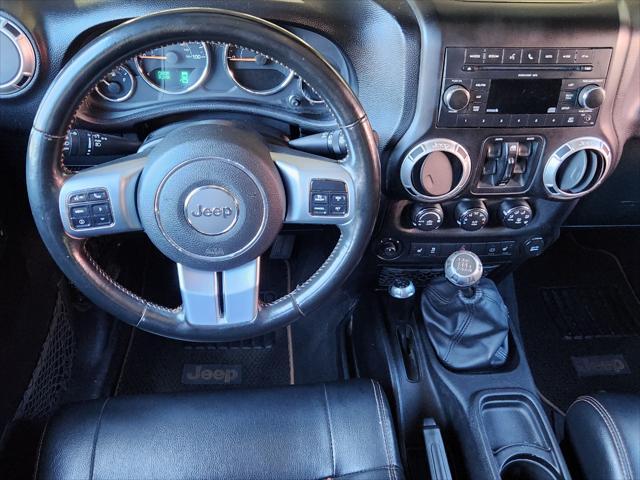 used 2011 Jeep Wrangler Unlimited car, priced at $18,988