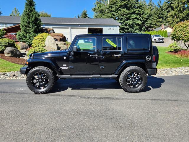 used 2011 Jeep Wrangler Unlimited car, priced at $18,988