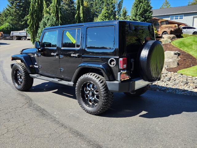 used 2011 Jeep Wrangler Unlimited car, priced at $18,988