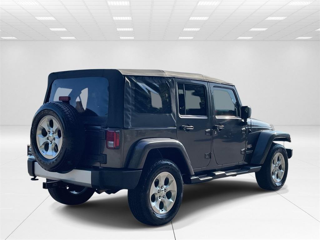 used 2014 Jeep Wrangler Unlimited car, priced at $18,942