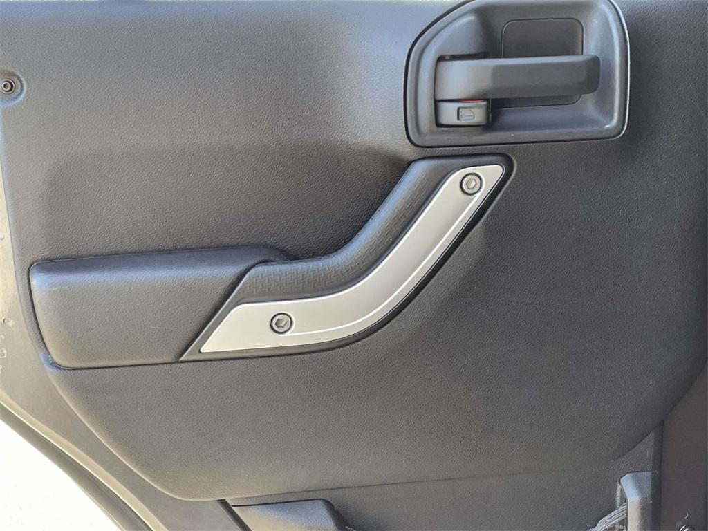 used 2014 Jeep Wrangler Unlimited car, priced at $18,942