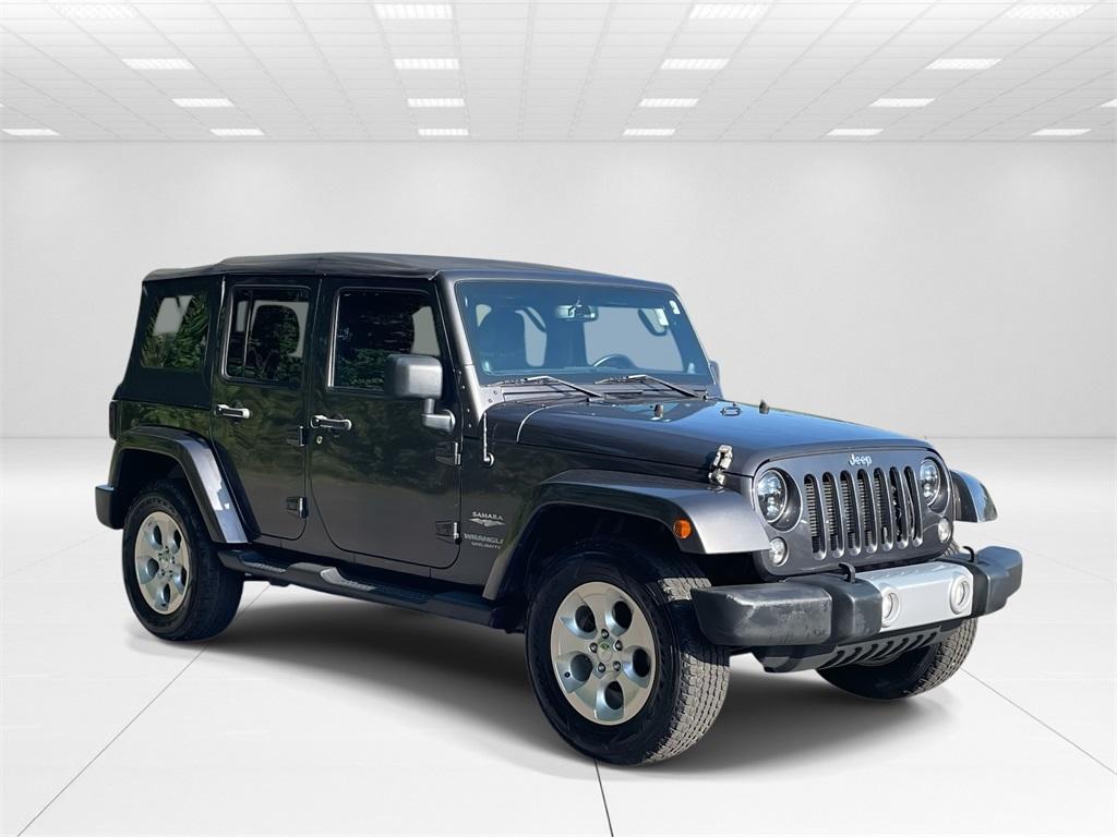 used 2014 Jeep Wrangler Unlimited car, priced at $18,942