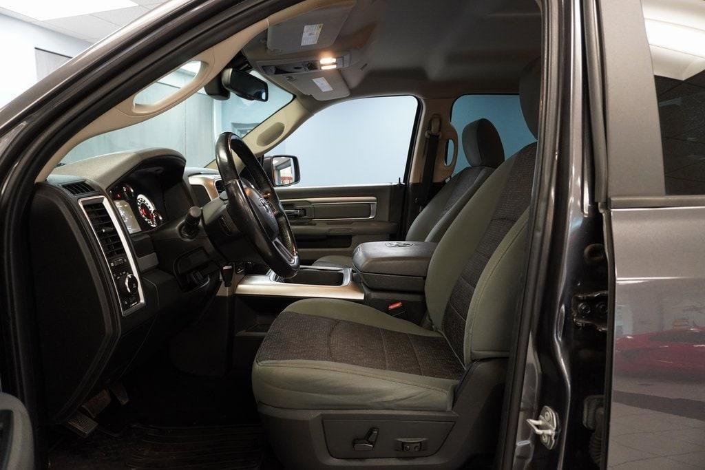 used 2018 Ram 1500 car, priced at $25,597