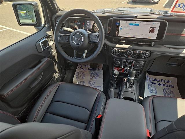 used 2025 Jeep Wrangler car, priced at $59,900