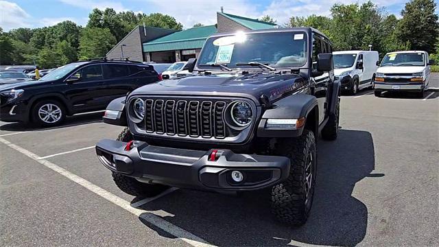 used 2025 Jeep Wrangler car, priced at $59,900