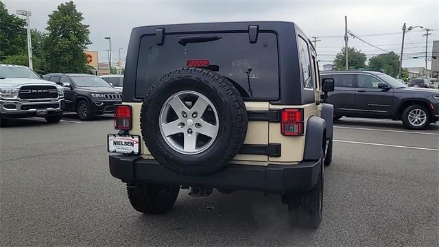 used 2011 Jeep Wrangler Unlimited car, priced at $18,590