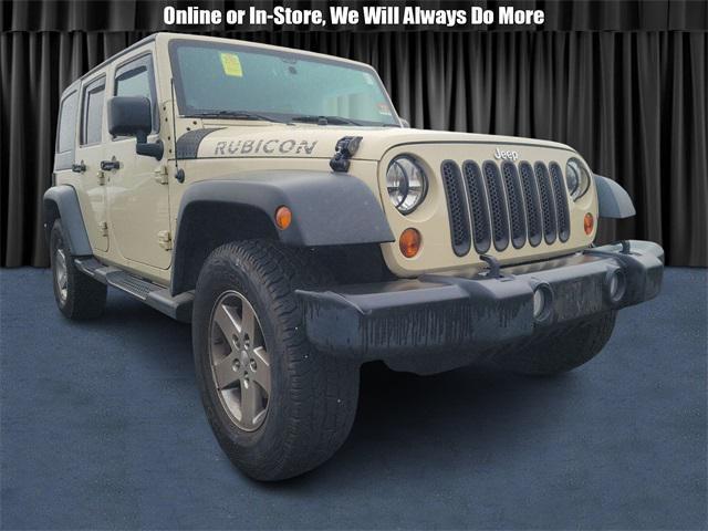 used 2011 Jeep Wrangler Unlimited car, priced at $19,900