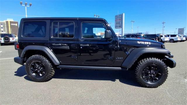 used 2021 Jeep Wrangler Unlimited car, priced at $28,733