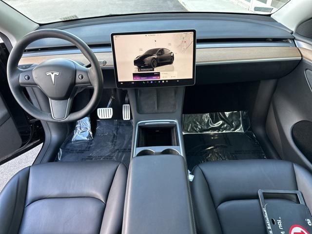 used 2023 Tesla Model Y car, priced at $29,900