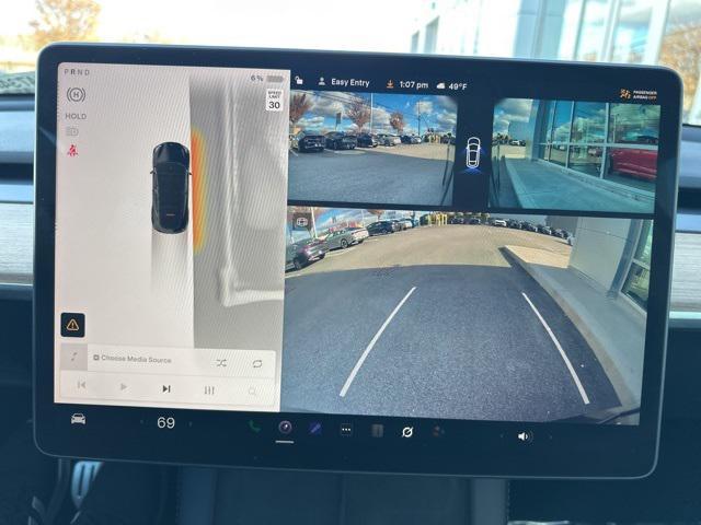 used 2023 Tesla Model Y car, priced at $29,900