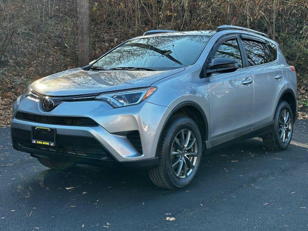 used 2018 Toyota RAV4 car, priced at $15,800