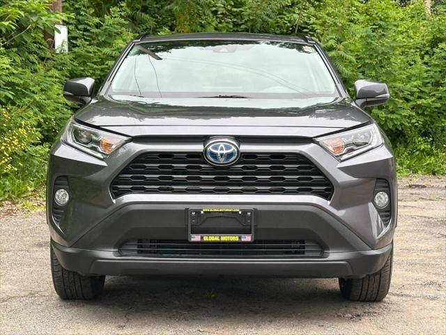 used 2021 Toyota RAV4 Hybrid car, priced at $26,800