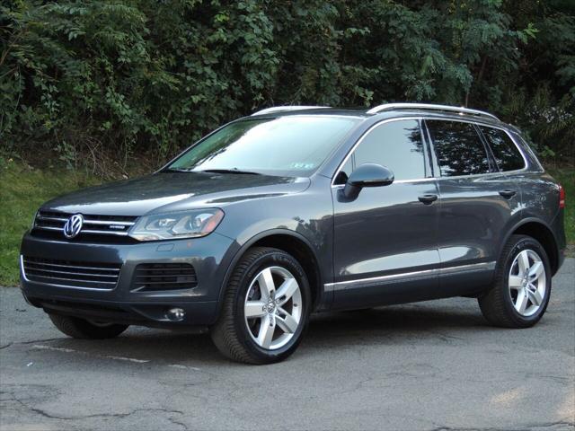 used 2013 Volkswagen Touareg Hybrid car, priced at $14,800