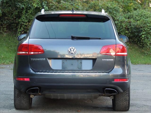 used 2013 Volkswagen Touareg Hybrid car, priced at $14,800