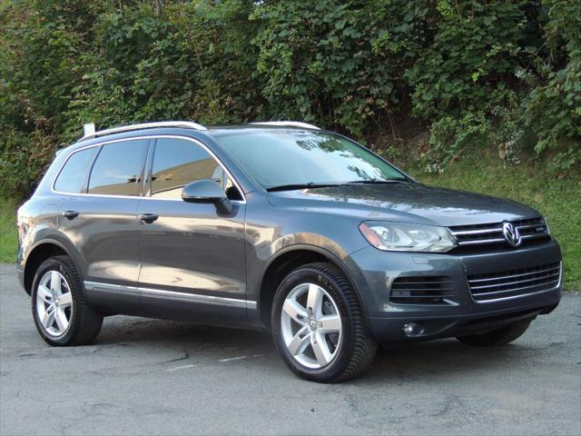 used 2013 Volkswagen Touareg Hybrid car, priced at $14,800