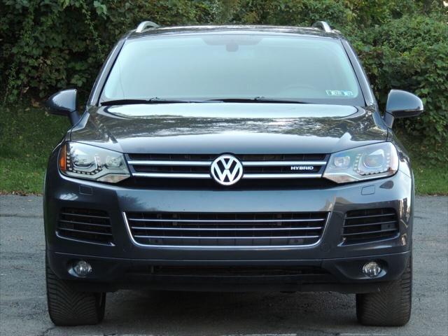 used 2013 Volkswagen Touareg Hybrid car, priced at $14,800