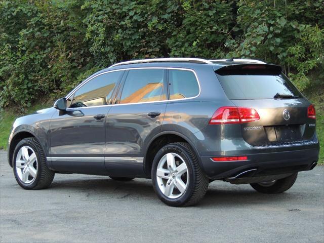 used 2013 Volkswagen Touareg Hybrid car, priced at $14,800