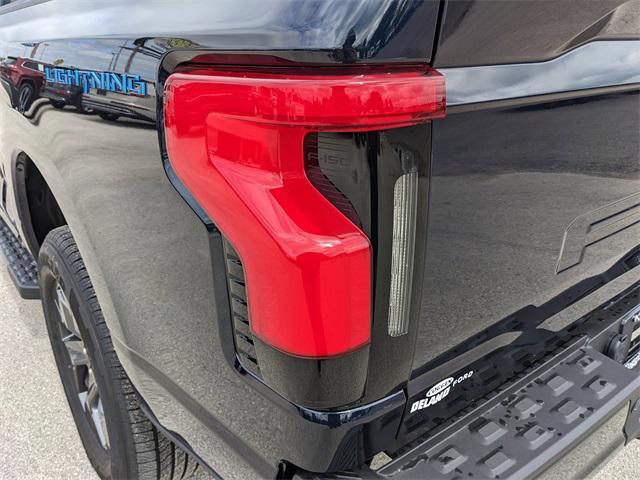 new 2025 Ford F-150 Lightning car, priced at $64,085