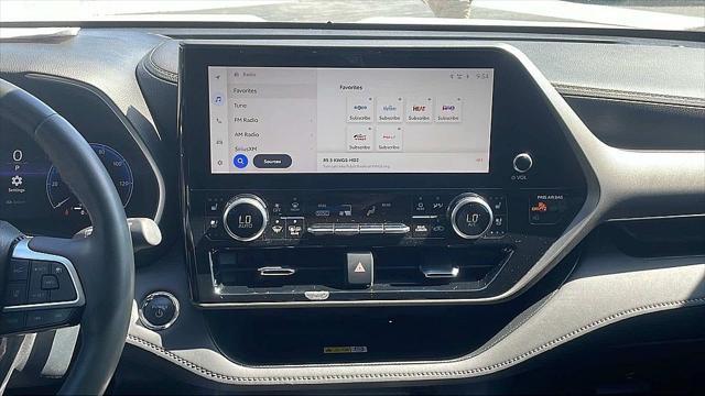 used 2023 Toyota Highlander Hybrid car, priced at $48,910