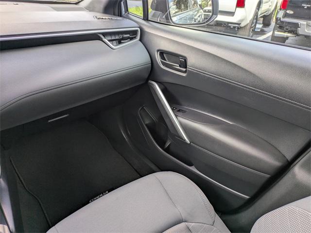 used 2024 Toyota Corolla Cross Hybrid car, priced at $27,998