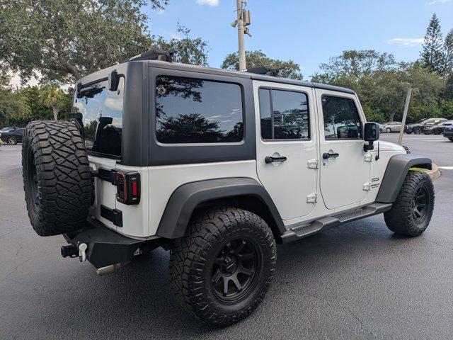 used 2016 Jeep Wrangler Unlimited car, priced at $17,488