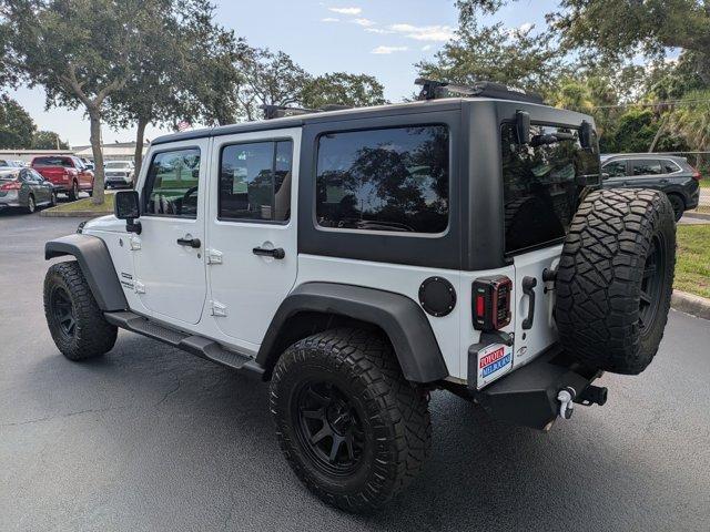 used 2016 Jeep Wrangler Unlimited car, priced at $17,488