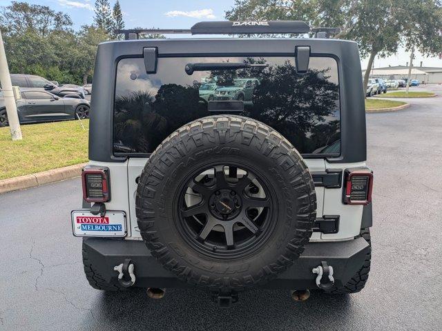 used 2016 Jeep Wrangler Unlimited car, priced at $17,488