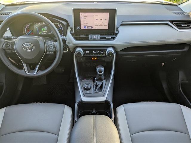 used 2023 Toyota RAV4 Hybrid car, priced at $32,499