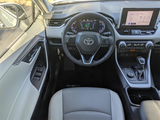used 2023 Toyota RAV4 Hybrid car, priced at $32,499
