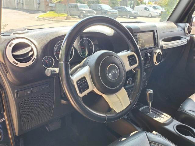 used 2015 Jeep Wrangler Unlimited car, priced at $14,878