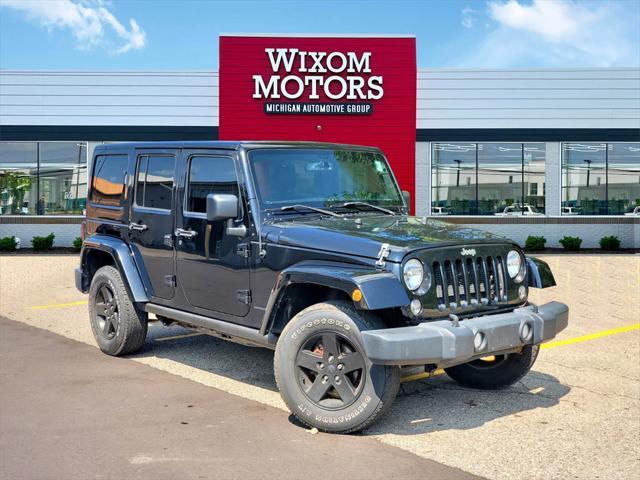 used 2015 Jeep Wrangler Unlimited car, priced at $14,878