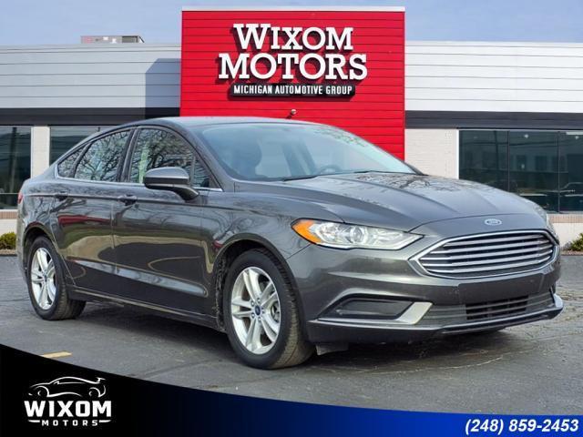 used 2018 Ford Fusion car, priced at $11,856